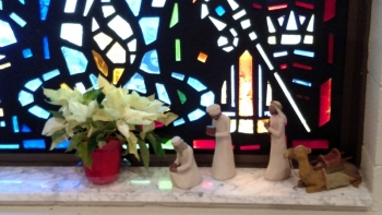 Magi move from the back to the front of the church as they search for Christ